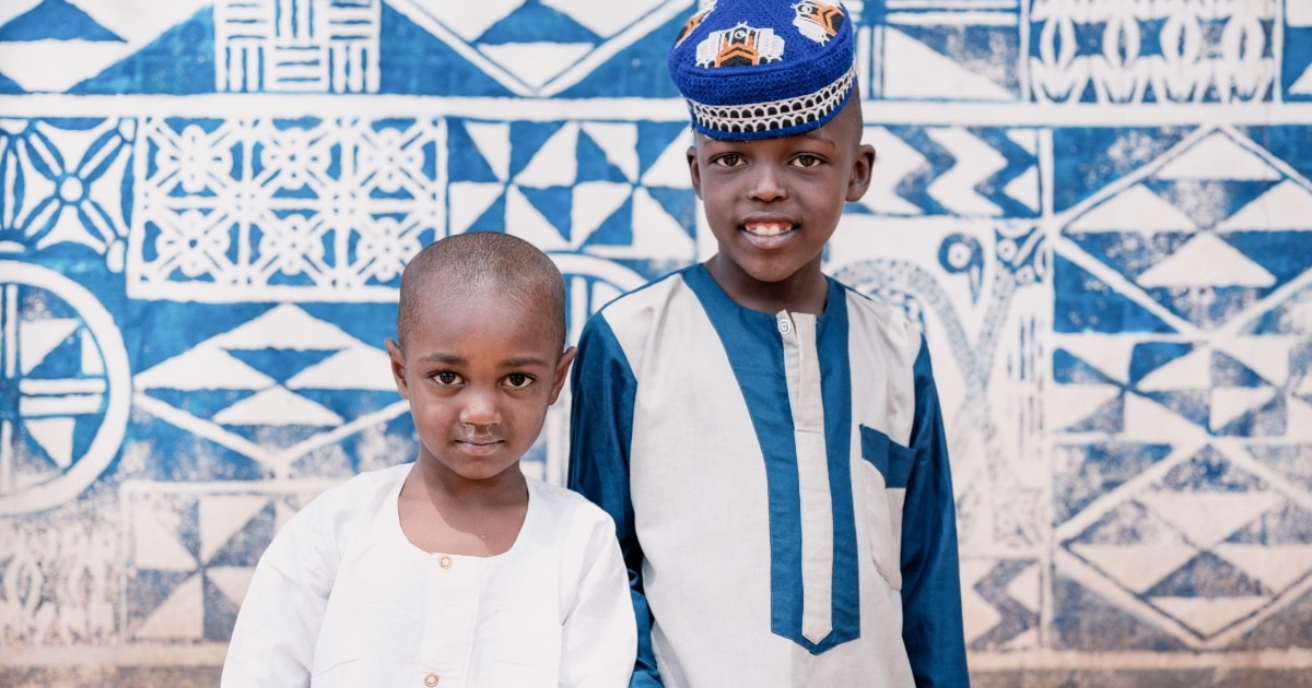 Two Bamum brothers at the Foumban Sultan Palace by Florian Huguenin